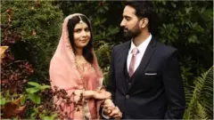 Malala Yousafzai and Asser Malik