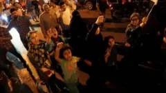 Protesters in Cairo's Tahrir Square after corruption allegations were made against President Fattah al-Sisi
