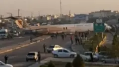 The aircraft stands on a road after skidding off the runway at Mahshahr airport