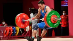 Thạch Kim Tuấn đi đấu ở nội dung cử tạ nam hạng 61 kg