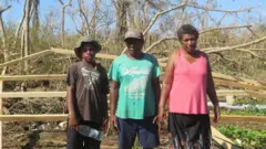 Ezekiel and his wife, Joycelyn with their 12 year old nephew, Kenneth