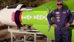 Mike Hughes in front of his rocket
