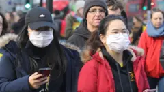 People wearing masks in London on 1 March
