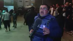 BBC Arabic reporter Adnan El-Bursh in front of Nasser hospital in Khan Younis