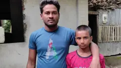 মোঃ ওসমান গনি ও তার উদ্ধারকারী মোঃ জুয়েল ইসলাম।