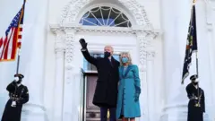 President Joe Biden waves to supporters
