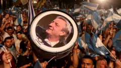 Supporters of presidential candidate Alberto Fernandez celebrate in Buenos Aires, Argentina