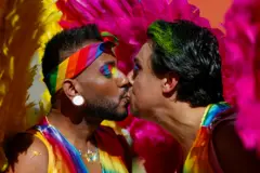 Revelers take part in the 27th Gay Pride Parade in Sao Paulo, Brazil, on June 11, 2013. (Photo by Miguel SCHINCARIOL / AFP) (Photo by MIGUEL SCHINCARIOL/AFP via Getty Images)