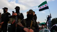 عناصر من هيئة تحرير الشام في سوريا.
