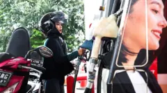 Seorang perempuan mengisi bahan bakar di sebuah SPBU di Jakarta, Maret 2026.
