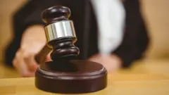 Биринчи Май райондук соту Бакиевдерге карата Кумтөр иши боюнча сот өкүмүн чыгарды