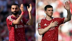 Mohamed Salah and Andy Robertson wave goodbye at Anfield
