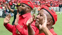 Julius Malema and one member of im party