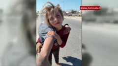 Dis girl carry her sister for back
