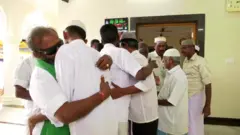 Hindus and Muslims greeting each other