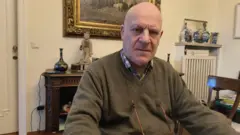 Jean Flamme yunganira Basabose avuga ko uwo agiye gushengeza ubwa mbere ari umushikirizamanza w'igihugu muri urwo rubanza, Catherine Grosjean