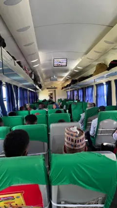 Passengers sitting in a train