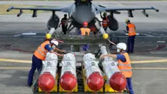 Missiles being loaded into a F-16 in Taiwan