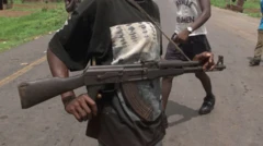 Ènìyàn tó gbé ìbọn lọ́wọ́