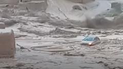아프가니스탄 홍수로 일가족이 탄 자동차가 물 속에 갇혔다. 