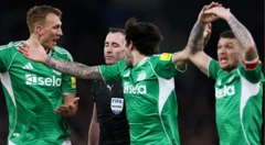 Newcastle players protest in the FA Cup