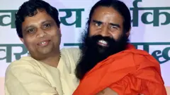 रामदेव और बालकृष्ण 