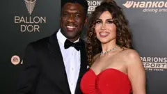 کلارنس سیدورف و همسرش، سوفیا (سپیده) مکرمتی، در شصت و هشتمین دوره مراسم اهدای توپ طلا