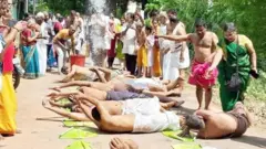 எச்சில் இலை மீது உருள்தல்