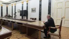 путін