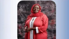 Woman in red standing