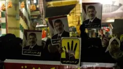 Waa mar taageerayaal Maxamed Mursi ay muddoharaadyo ka dhigayeen Masar