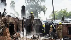 Рятувальники працюють на місці атаки в Полтаві