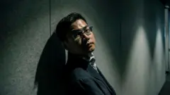Wang "William" Liqiang photographed for The Age newspaper