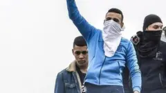 Detainees protest on the roof of the San Vittore prison in Milan, northern Italy, 9 March 2020