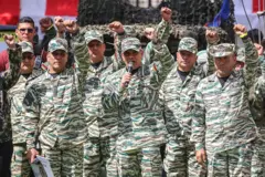 O ministro da Defesa venezuelano, Vladimir Padrino López, fala durante sessão de treinamento da Milícia Nacional Bolivariana em Caracas, em 4 de outubro de 2025.