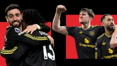 Manchester United players celebrate against Arsenal