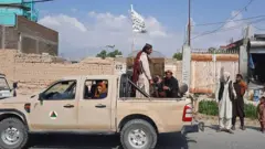 Taliban fighters in Laghman province on 15 August 2021