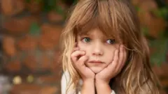 طفلة