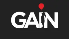 Gain medya logosu siyah arka planda i harfinde kırmızı balon ve çocuk imgesi. 