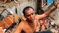 પૂરથી પીડિત વ્યક્તિ