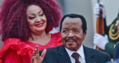 Biya ve eşi Chantal bir arada fotoğraflanmış. Biya elini kaldırmış eşi ise kırmızı saçlarına eşlik eden kırmızı bir elbise giyiyor.