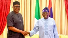 Ayo Fayose shake hand wit Tinubu