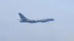A Chinese aircraft takes part in a military drill near Taiwan
