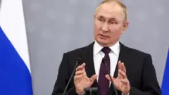 Путин
