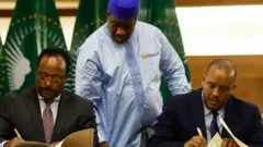 ኣምባሳደር ሬድዋን ሑሴንን ኣቶ ጌታቸው ረዳን ኣብ ፕሪቶሪያ