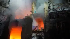 Последствия удара по жилым домам в Запорожье