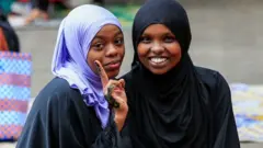 Worshippers pose for a photo after performing Eid prayers at the Masjid Noor Mosque in Nairobi, Kenya