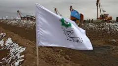 س