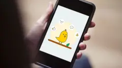 একটি স্মার্টফোনে কু মাইক্রোব্লগিং অ্যাপ