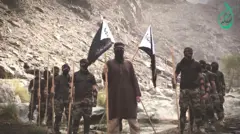 چند عضو گروه جیش العدل در یک فیلم تبلیغاتی